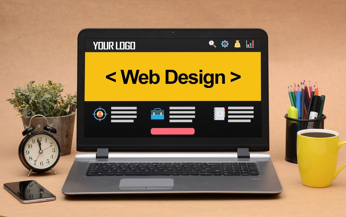 Website Design mockup in office laptop